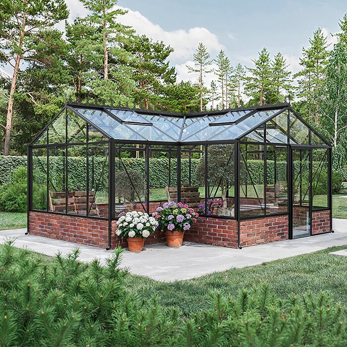 Arkitektoniskt T-orangeri med pulverlackerad aluminiumram och klar glasning